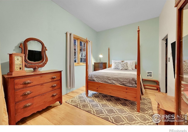 bedroom with light hardwood / wood-style flooring