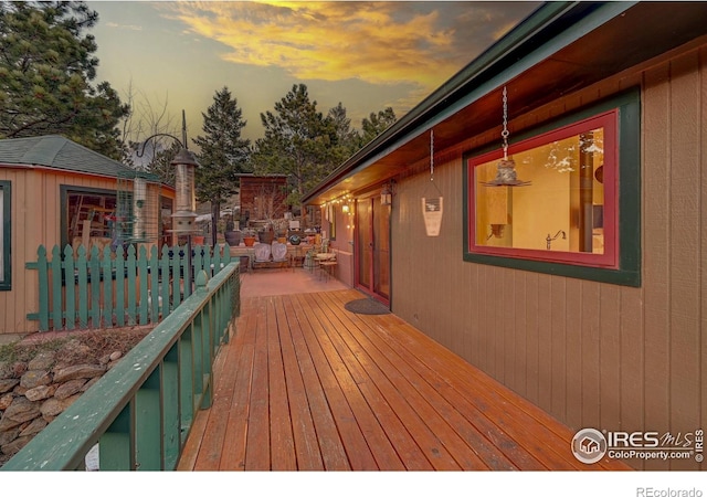 view of deck at dusk