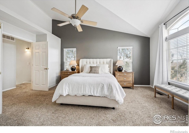 bedroom featuring ceiling fan, carpet flooring, and multiple windows