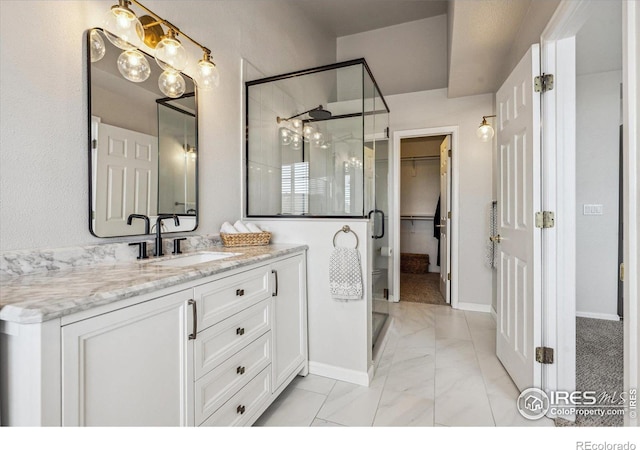 bathroom with vanity and walk in shower