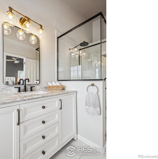 bathroom with vanity and an enclosed shower