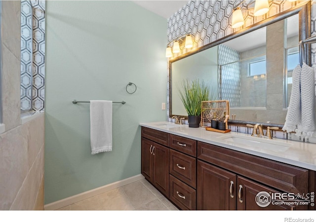 bathroom featuring tile patterned floors and vanity