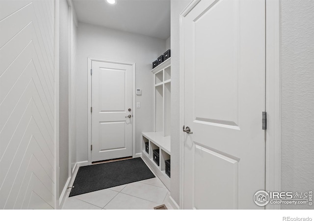 mudroom featuring light tile patterned flooring