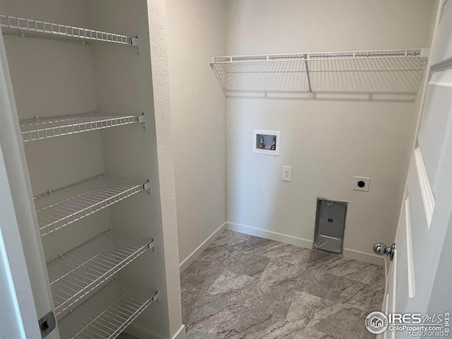 laundry room with hookup for a washing machine and hookup for an electric dryer