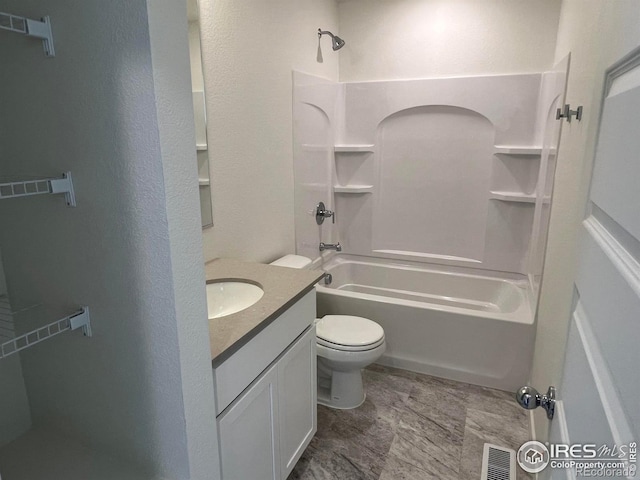 full bathroom with shower / bathing tub combination, vanity, and toilet