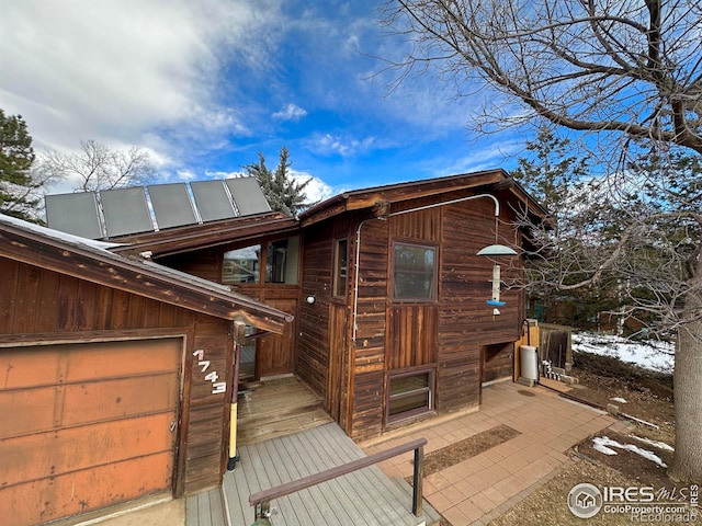 exterior space featuring a garage