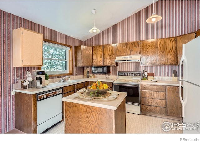 kitchen with lofted ceiling, sink, hanging light fixtures, a kitchen island, and white appliances