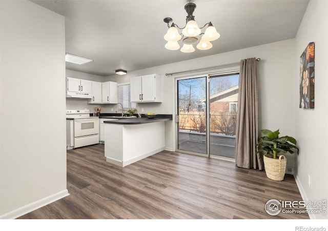 kitchen with decorative light fixtures, a chandelier, kitchen peninsula, white range with electric stovetop, and white cabinets