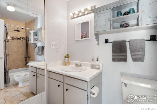 full bathroom with vanity, shower / tub combo, and toilet