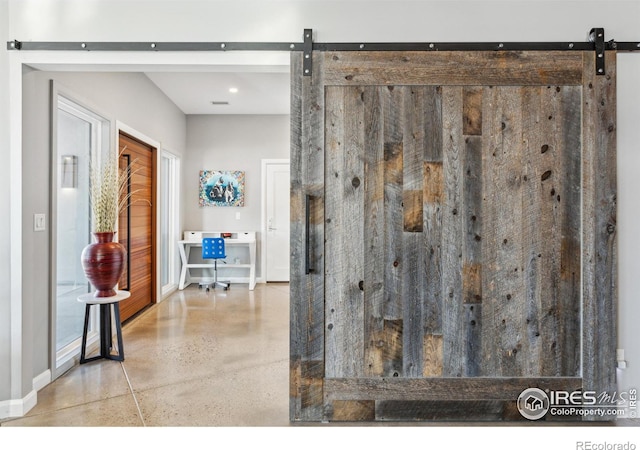 interior space with a barn door