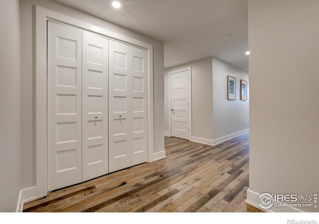 hall featuring hardwood / wood-style flooring