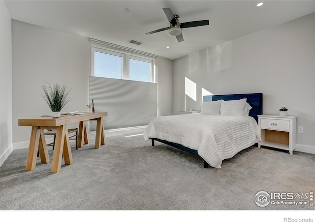 carpeted bedroom featuring ceiling fan