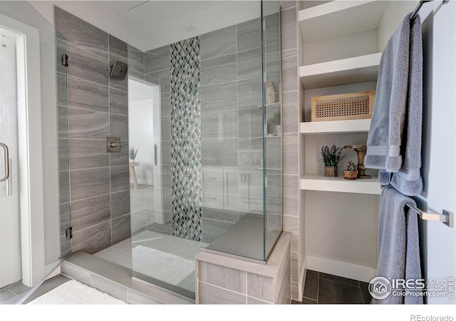 bathroom featuring an enclosed shower