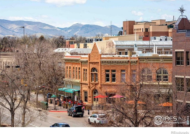 view of building exterior featuring a mountain view