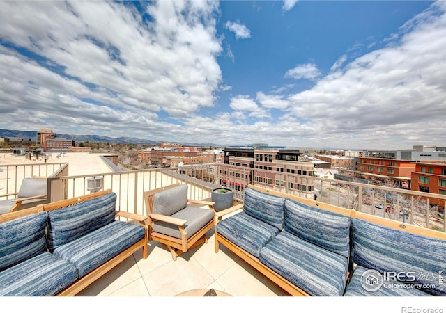 exterior space with a balcony and an outdoor hangout area