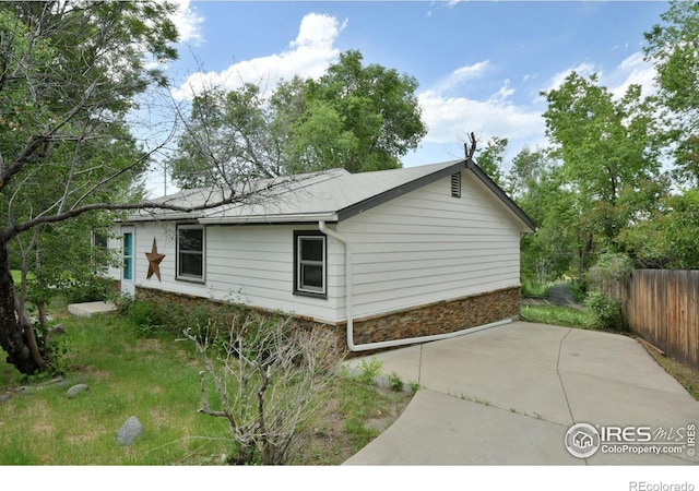 view of property exterior featuring a patio