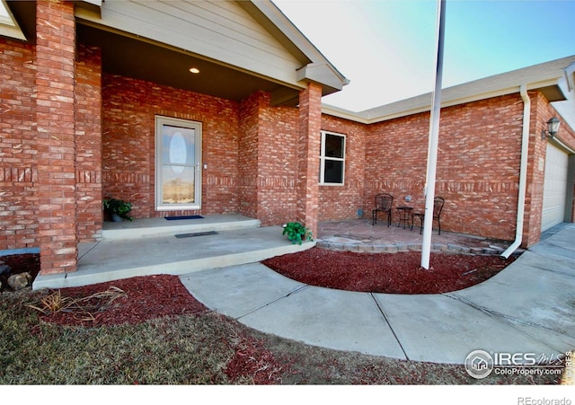 property entrance featuring a garage