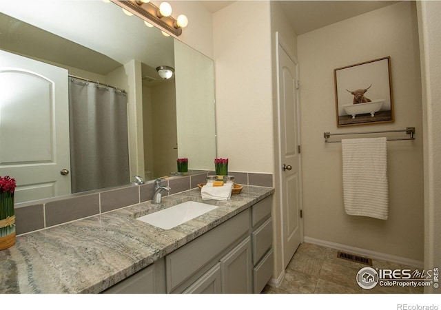 bathroom featuring vanity