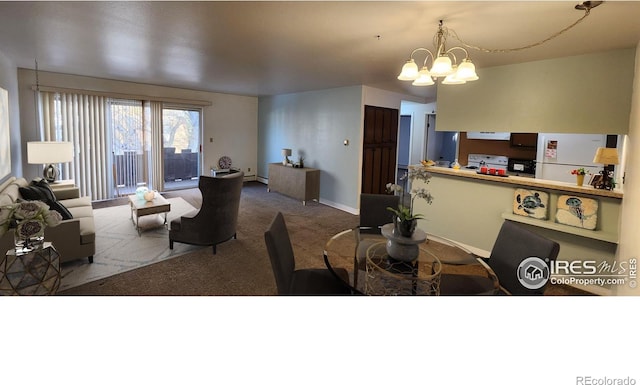 carpeted dining room featuring baseboards and a chandelier