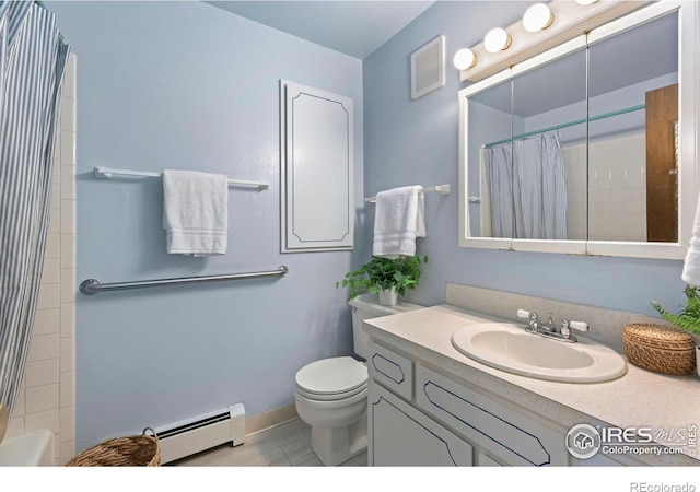 bathroom featuring vanity, a baseboard radiator, and toilet