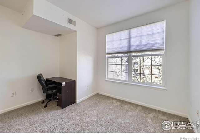 5756 N Genoa Way Unit 205, Aurora, CO 80019 - unfurnished office featuring carpet flooring and baseboards