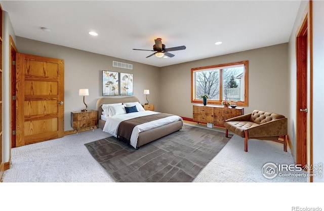 carpeted bedroom with ceiling fan