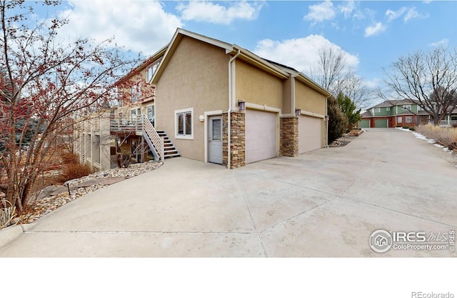 view of property exterior featuring a garage