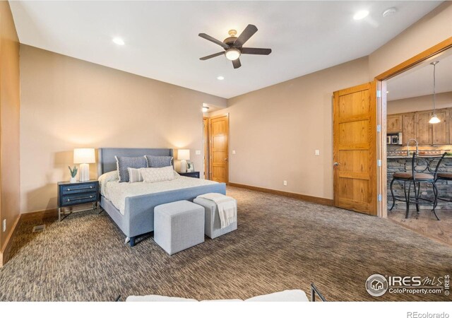 carpeted bedroom with ceiling fan, recessed lighting, and baseboards