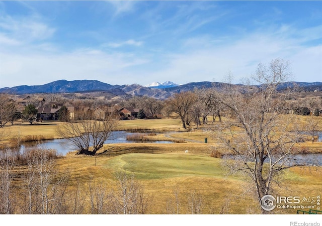 property view of mountains featuring a water view