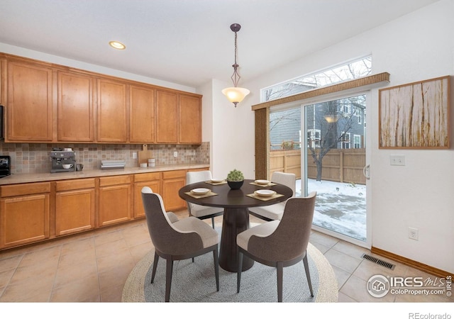 dining room featuring light tile patterned floors