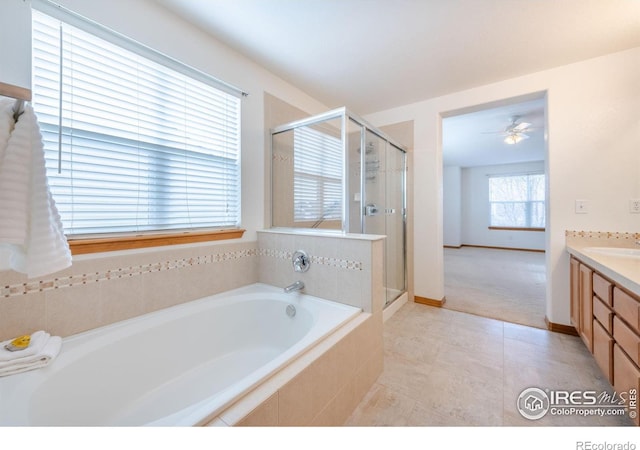 bathroom featuring vanity and plus walk in shower