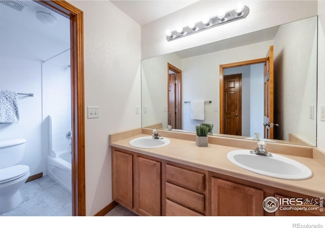 full bathroom featuring vanity, tub / shower combination, and toilet