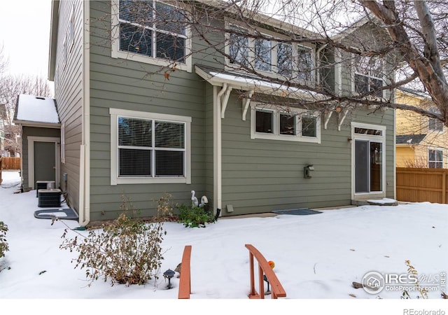 view of snow covered house