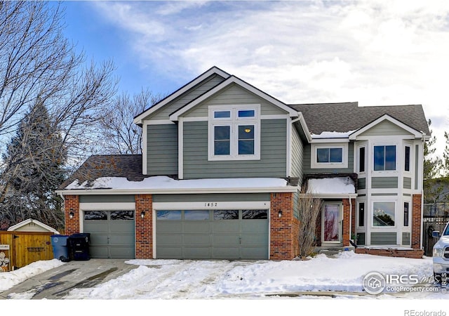 view of front of property with a garage