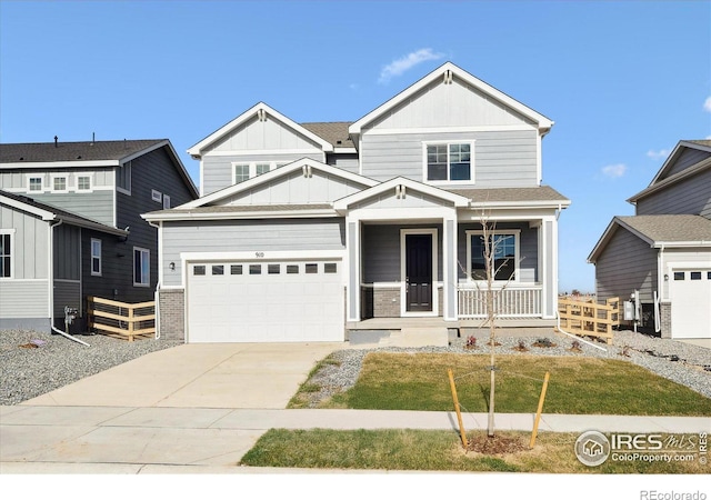 view of front of home featuring a garage and a porch