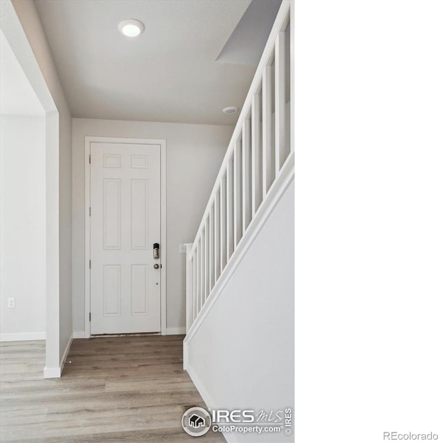 entrance foyer featuring light hardwood / wood-style floors