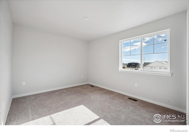 view of carpeted empty room