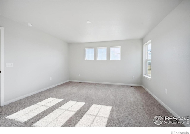 view of carpeted spare room