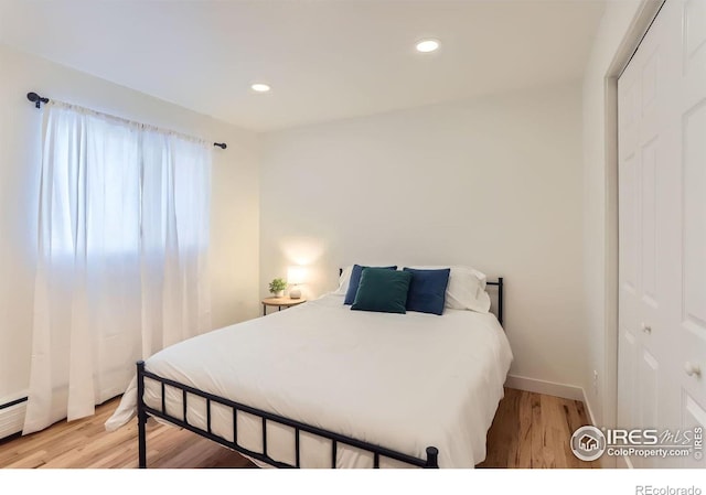 bedroom featuring hardwood / wood-style floors