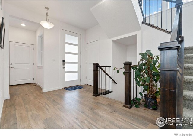 foyer entrance featuring light wood-type flooring