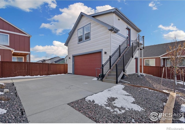 view of front of property with a garage