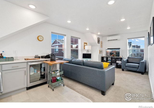 living room featuring beverage cooler and a wall unit AC