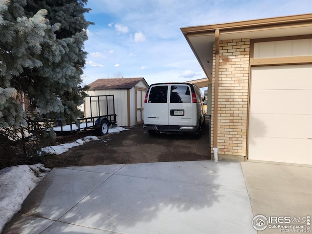 view of home's exterior with a storage shed