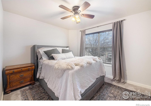 carpeted bedroom featuring ceiling fan