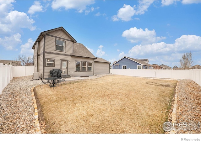 back of house featuring a patio and central air condition unit