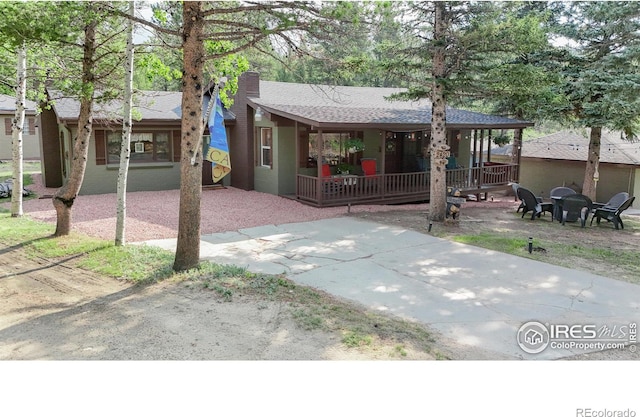 2420 Big Owl Rd, Allenspark, CO 80510 - view of front facade with a patio