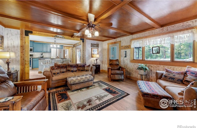2420 Big Owl Rd, Allenspark, CO 80510 - living room with ceiling fan, coffered ceiling, beam ceiling, and light hardwood / wood-style flooring