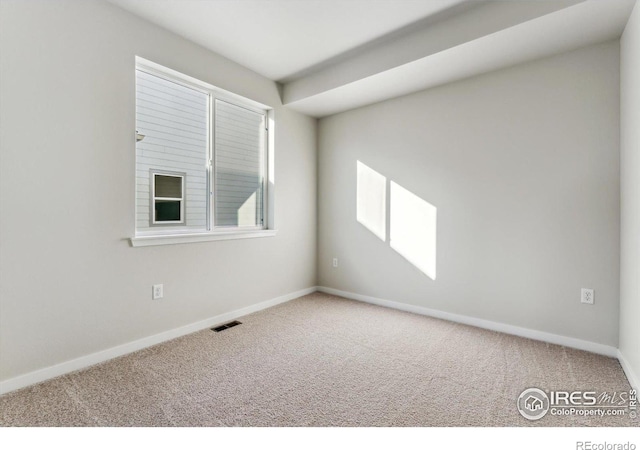 view of carpeted spare room