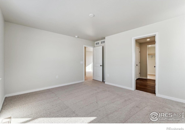 unfurnished bedroom featuring carpet