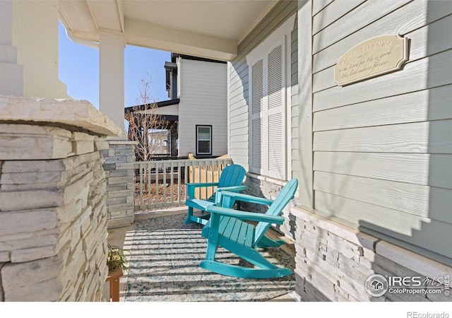 balcony featuring covered porch